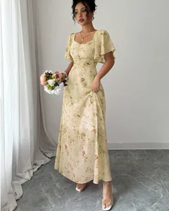 Elegant floral print maxi dress featuring feminine flutter sleeves and a gathered bodice