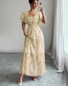 Elegant floral print maxi dress featuring ruffled flutter sleeves and slim waist design