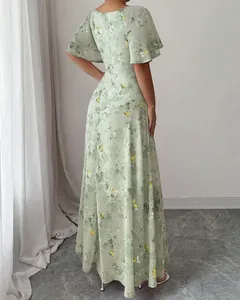 Back view of light green maxi dress with butterfly print and flutter sleeves