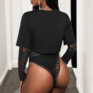 Back view of a black knit T-shirt layered with floral lace long sleeve thong bodysuit