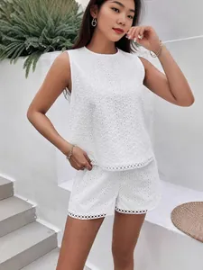 Stylish white eyelet embroidery sleeveless top and matching shorts summer two-piece set