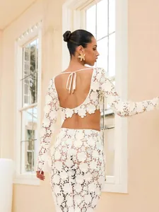 French white floral lace two-piece set with backless long sleeve top and fishtail maxi skirt