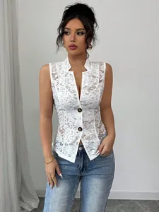 Detailed view of a sleeveless white floral lace cardigan with V-neck and button closure