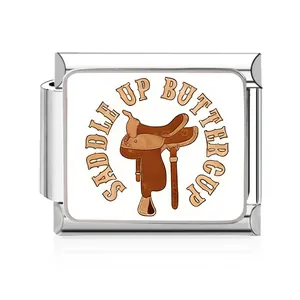 Close-up detail of stainless steel Italian charm link with Western saddle and cowboy theme