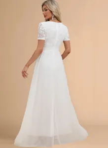 Back view of elegant white lace chiffon maxi dress for wedding or evening gala