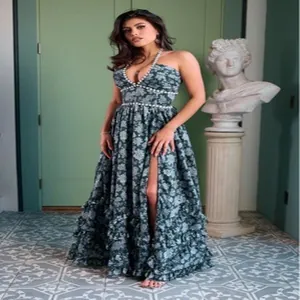 Elegant floral print halter maxi dress with pearl detailing and high leg slit detail.