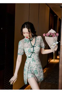 Modern lace Qipao two-piece set with green floral pattern in an elegant indoor setting