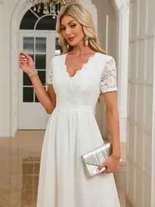 Elegant white V-neck evening dress with lace bodice and pleated chiffon skirt for weddings