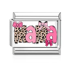 Detail of Italian charm link with 'Mama' text, leopard print, and pink bows on steel.