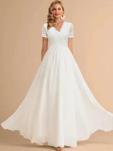 Elegant white V-neck evening gown featuring a delicate lace bodice and flowing chiffon skirt