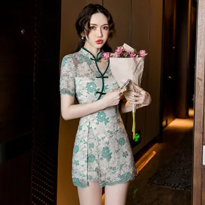 Elegant improved Qipao two-piece set featuring green lace floral embroidery and slim fit.