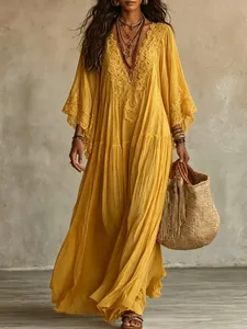 Detailed view of yellow bohemian lace patchwork V-neck long maxi dress with batwing sleeves