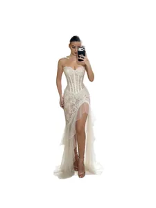 Sexy white strapless lace corset evening dress with elegant ruffles and high slit detail