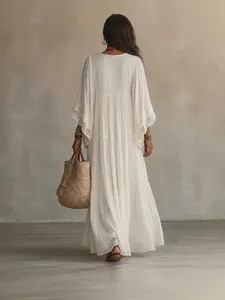 Bohemian white lace patchwork maxi dress with batwing sleeves and tiered skirt