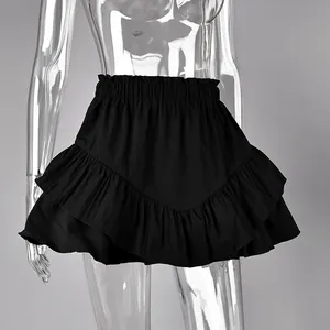 Elegant black high-waisted tiered ruffled mini skirt with detailed elastic waistband.
