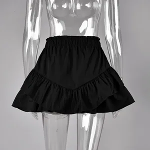 Close-up detail of black high-waisted ruffled tiered cake mini skirt