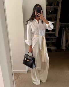 Elegant cream satin wrap belt with long fringe tassels for waist cinching