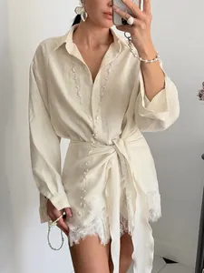 Elegant French style wrap shirt set featuring intricate lace trim and waist tie detail
