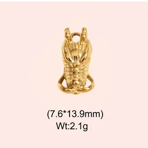 Detailed view of vintage gold dragon head pendant with size and weight parameters