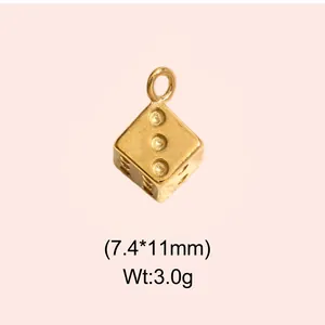 Detailed view of a vintage gold-colored stainless steel dice charm for jewelry making