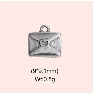 Vintage stainless steel heart envelope pendant detail showing 9x9.1mm size and 0.8g