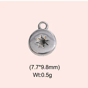 Close-up of vintage stainless steel circular star charm with size and weight info