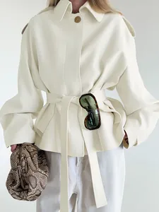 Elegant cream matte velvet belted trench coat featuring a sharp collar and waist tie