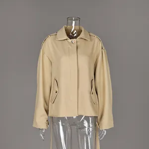 Front view of khaki lapel frosted velvet long-sleeved trench coat on mannequin