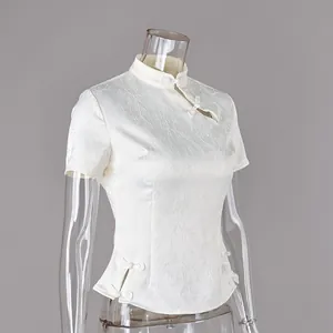 Detailed view of a white New Chinese style jacquard blouse with retro frog buttons
