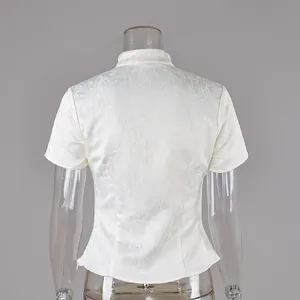Back view showing intricate jacquard texture of white new Chinese style high collar shirt