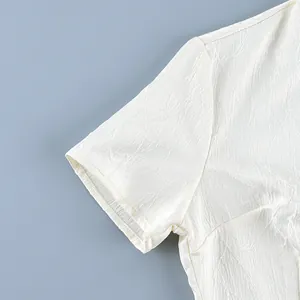Detail shot of white textured fabric for New Chinese style short sleeve shirt