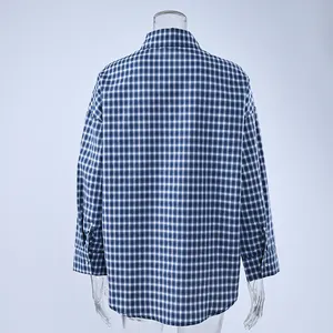 Back view of women's vintage cotton plaid shirt with blue and white checkered pattern