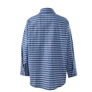 Back view detail showing the fabric texture of a classic blue cotton plaid shirt for women