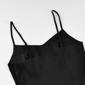 Close-up detail of black slim fit camisole with adjustable straps and side zipper