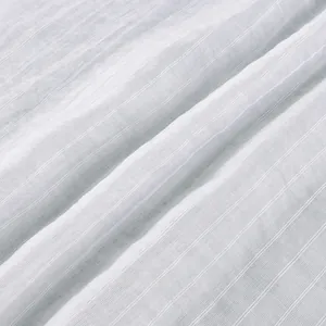 Macro detail of breathable semi-transparent fabric with subtle white pinstripe texture