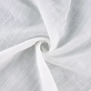 Macro view of white semi-transparent fabric featuring a subtle vertical pinstripe texture