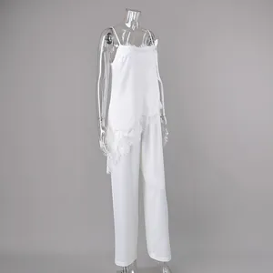 Elegant white two-piece set featuring lace-trim camisole and straight-leg trousers