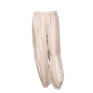 Champagne shiny satin lantern pants with elastic waist for a relaxed and stylish summer look.