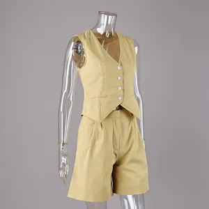 Professional detail view of a chic cotton linen vest and shorts set on mannequin