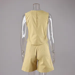 Detailed back view of the yellow cotton linen sleeveless vest and high-waisted shorts set