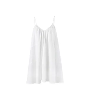 White V-neck spaghetti strap dress with a loose A-line holiday style silhouette.