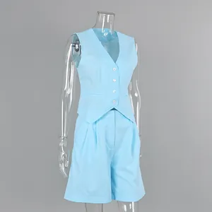 Detailed view of a light blue cotton linen vest and shorts two-piece outfit
