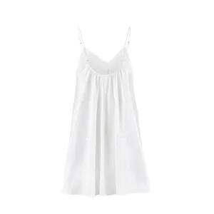 Detailed view of a white V-neck spaghetti strap mini dress with loose A-line cut