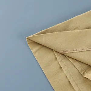 Detailed view of high-quality cotton linen fabric and inner stitching on vest