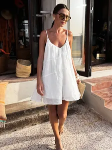 Elegant white V-neck spaghetti strap mini A-line vacation dress for women's summer