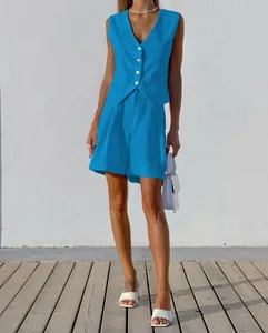 Vibrant blue cotton linen two-piece set featuring a tailored vest and matching shorts