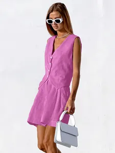 Detailed view of fuchsia pink linen vest and shorts set for minimalist summer commute fashion