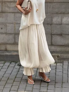 Elegante crèmekleurige lantaarnbroek met ruches voor een chique casual streetlook.