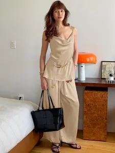 Elegant champagne satin camisole and wide-leg trousers two-piece loungewear set