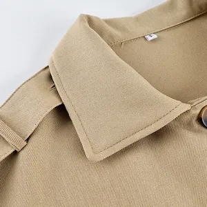 Close-up detail of khaki frosted velvet trench coat lapel showing fabric texture